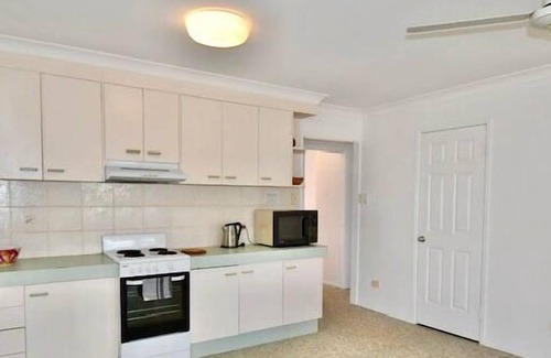 Woodgate House | Lowset Home with Ocean Views