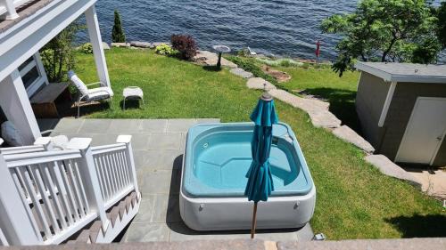 Plattsburgh Apartment | Loza house adirondack screened-in porch unit lake front