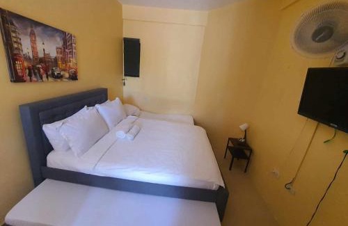Lucena Apartment | Lucena Meg's Studio Apmnt Deluxe rm-Near SM-Wifi