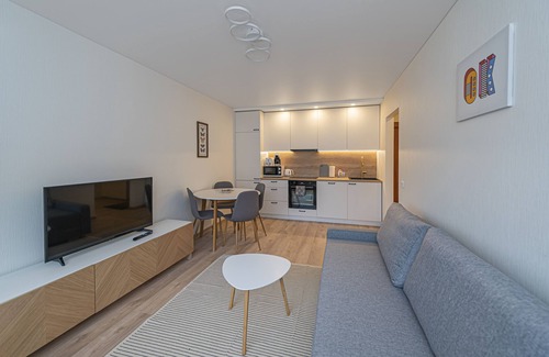 Kaunas Apartment | Luminious apartment with balcony by Polo Apartments