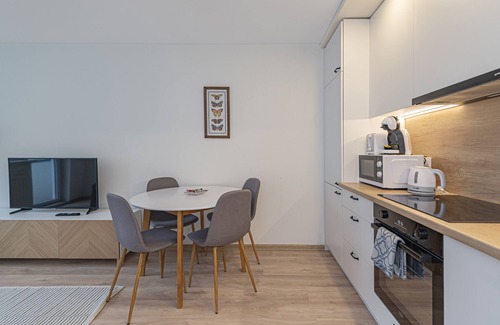 Kaunas Apartment | Luminious apartment with balcony by Polo Apartments