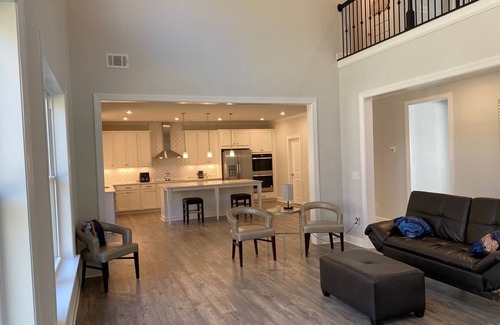 Douglasville House | Lux 3500 sq ft shared common area with 3-bedroom with smartkey deadbolt; desk