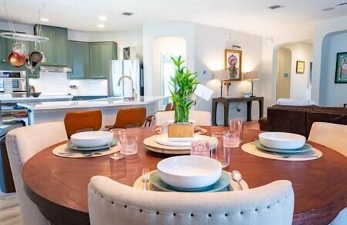 Wetmore House | Luxe Home-Designer BTHRM-Covered Deck-Weber Grill