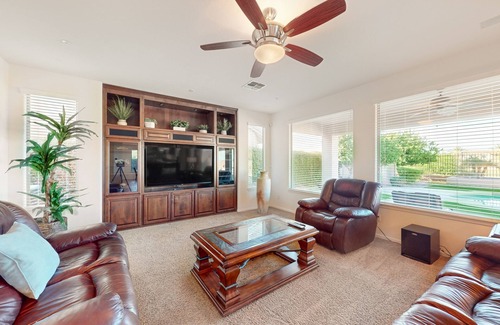 Seville House | Luxe snowbird-friendly haven with heated pool, gas fireplace, balcony, & firepit