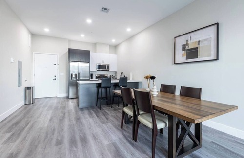 The Heights Apartment | Luxe Suite by NYC w Rooftop & Parking on Premises