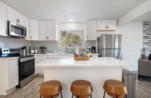 Concord House | LuxoStays | ! Modern 4BR w/Backyard & Nr HWY