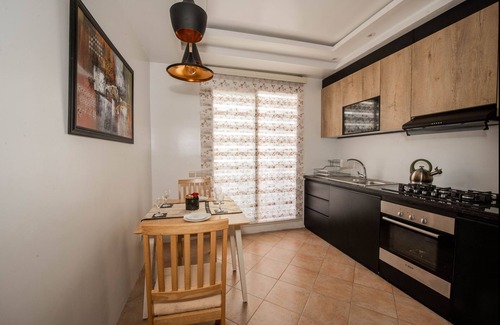 Nouaceur Apartment | Luxurious Apartment in Sidi Bou Zid with Garden View