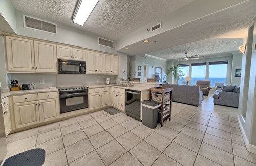 Thomas Drive Condo | Luxurious Beachfront Condo with Beachside Pool Access and Free WiFi - Unit 1202 by RedAwning