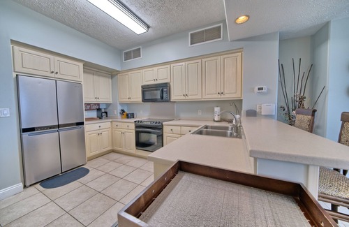 Thomas Drive Condo | Luxurious Beachfront Condo with Beachside Pool Access and Free WiFi - Unit 1202 by RedAwning