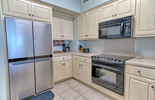 Thomas Drive Condo | Luxurious Beachfront Condo with Beachside Pool Access and Free WiFi - Unit 1202 by RedAwning