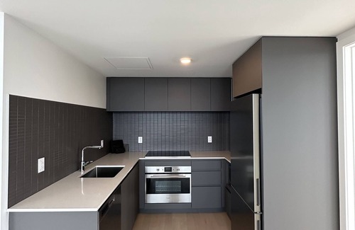 Downtown Montreal Apartment | Luxurious Condo located with the front row views of the Place des Festivals.n