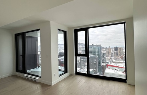 Downtown Montreal Apartment | Luxurious Condo located with the front row views of the Place des Festivals.n