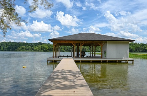 Louisa House | Luxurious lakeside home with private dock, beach, patio, & game room - dogs OK