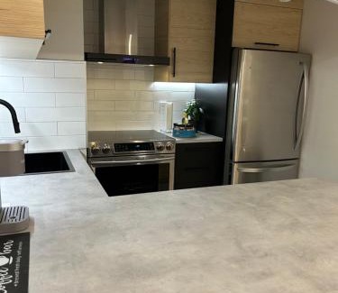Pickering Apartment | Luxurious modern basement apartment