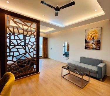 Greater Noida Apartment | Luxurious Suite with Panoramic glass wall