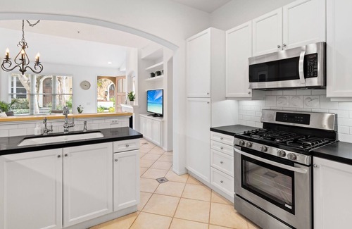 Newport Coast Condo | Luxurious, sunny, garden level villa In the heart of Newport Coast.