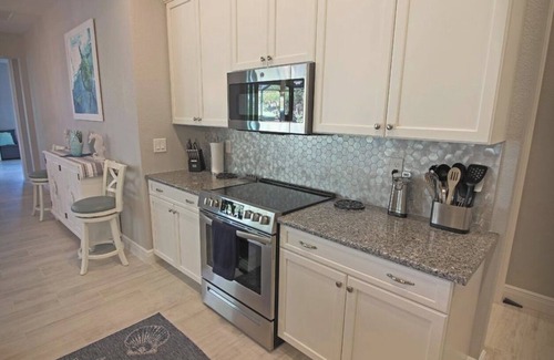 White Marsh House | Luxurious Vacation Home on Long Marsh Golf Course 11th Green in Rotonda West