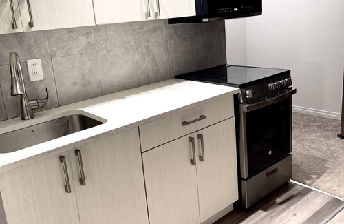 Calgary House | Luxury 1- bedroom secondary suite close to Airport.