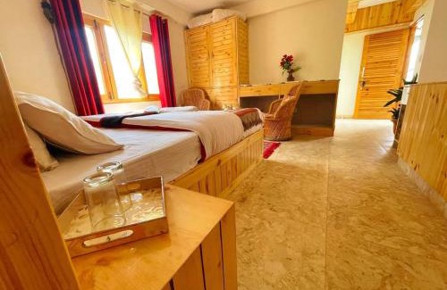Naggar Apartment | Luxury 1 BHK Apartment for Rent in Naggar,Manali with Modern Kitchen, Wooden Interior, and Spacious Bathroom