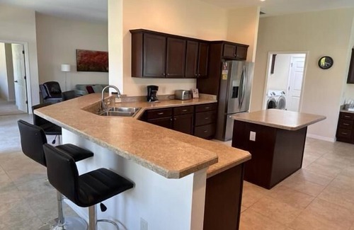 Fernandina House | Luxury 2 bed/2 bath designer home near Brownwood 2 person gas cart