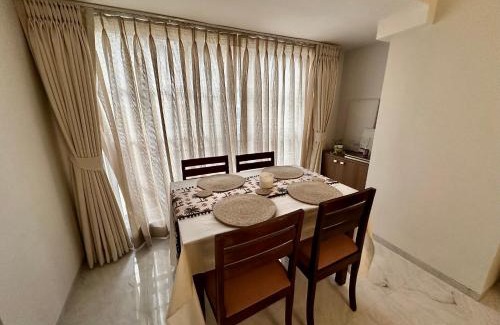 Khar Apartment | Luxury 2 BHK Tropical Apartment with Workspace in Khar West