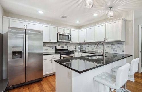 Lowry Hill East House | Luxury 4 Bed 5 Bath Penthouse with Rooftop Downtown Views