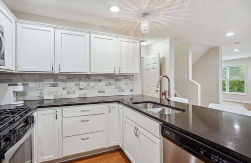 Lowry Hill East House | Luxury 4 Bed 5 Bath Penthouse with Rooftop Downtown Views