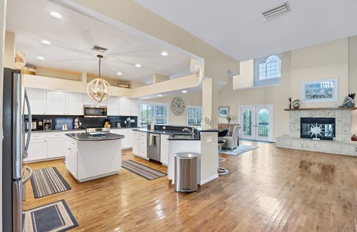Palm Island House | Luxury 4 Bedroom pool home close to beach, private dock on Kettle Harbor.