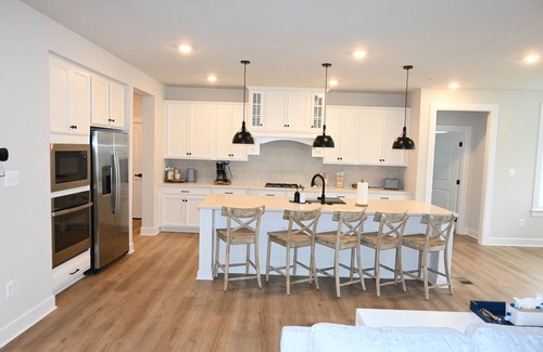 Bayside House | Luxury 5BD-4BTH, Spacious. home indoor-outdoor pool; waterfront community.
