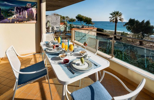 Mazzeo Apartment | Luxury Beachfront Apartment in Taormina w. Pool and Parking (2BR/2Bath)