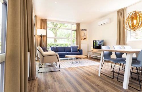 Ede Ski Chalet | Luxury chalet with dishwasher in a holiday park in the middle of De Veluwe