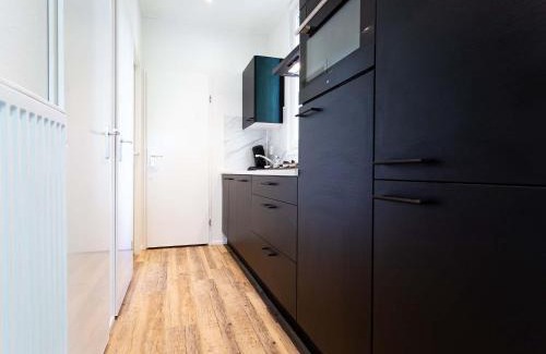 Ede Ski Chalet | Luxury chalet with dishwasher in a holiday park in the middle of De Veluwe