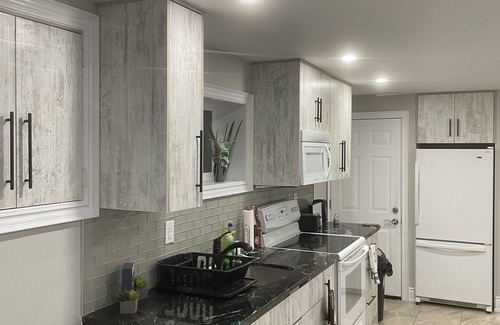 Rosemount House | Luxury & cozy 2 bedroom basement unit with own entrance