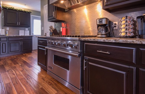 West Des Moines House | LUXURY GETAWAY! ARCADE, POOL TBL, PING PONG, HOT TUB, DECK! ACCESS TO POOLS!