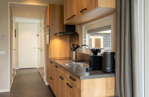Sint Nicolaasga House | Luxury holiday home surrounded by water