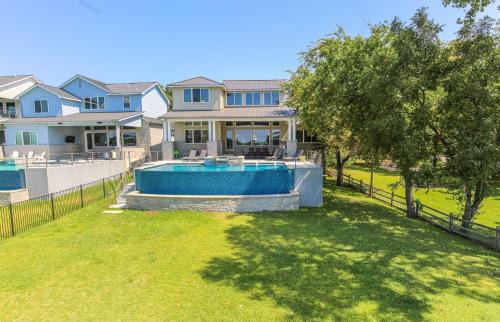 Kingsland House | Luxury Lake LBJ House with Heated Swimming Pool and Spill Over Hot Tub and 2 Boat Slips