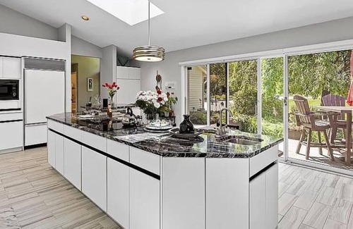 Norton Shores House | Luxury Lakefront 6-Bed Home in Norton Shores with Pool, Hot Tub, Video Games