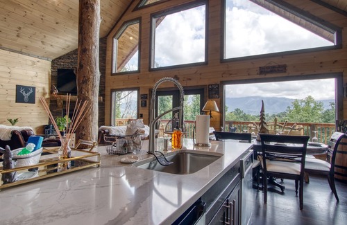 Gatlinburg Cabin | Luxury Mountain Cabin, Stunning Views, Man Cave, Theater Room, Hot Tub and More!