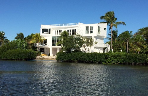 Cutthroat Harbor Estates House | Luxury * Panoramic Oceanfront Views * Boat Dock * Heated Pool