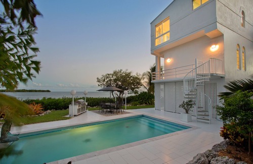 Cutthroat Harbor Estates House | Luxury * Panoramic Oceanfront Views * Boat Dock * Heated Pool