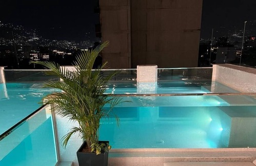 Zona Rosa Apartment | Luxury Penthouse Rooftop Pool 12 Bedroom Lleras Park