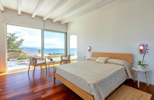 Fertilia Villa | Luxury Seafront Villa with Rooftop Pool & Stunning Sea Views