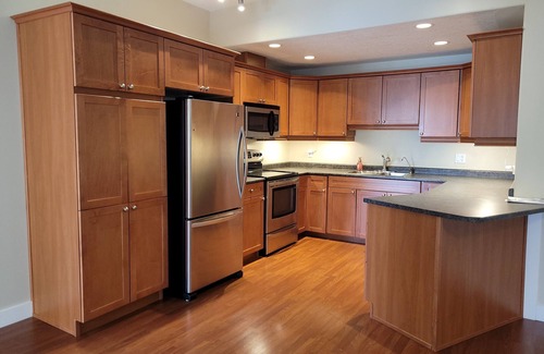 Division No. 11 Apartment | Luxury top floor apartment style condo with balcony. 25 minutes from EIA.