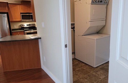 Division No. 11 Apartment | Luxury top floor apartment style condo with balcony. 25 minutes from EIA.