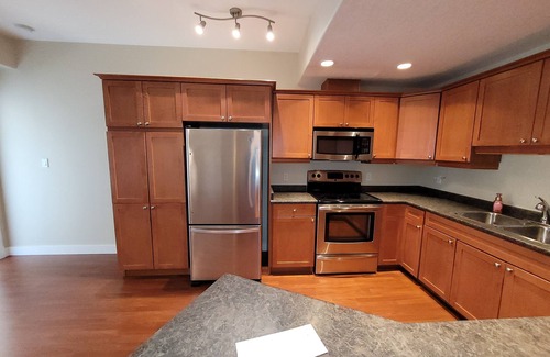 Division No. 11 Apartment | Luxury top floor apartment style condo with balcony. 25 minutes from EIA.