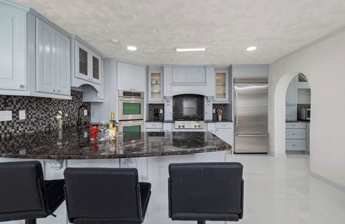 Clair-Mel City House | Luxury Villa| Waterfront + Heated Pool & Game Room