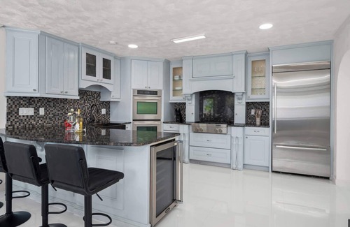 Clair-Mel City House | Luxury Villa| Waterfront + Heated Pool & Game Room