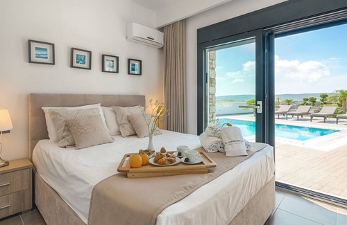 Kattavia Villa | Luxury Villa with Private Swimming Pool, BBQ, playground, 5 Min. from Prasonisi!