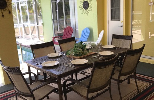 South Gulf Cove House | LUXURY WATERFRONT! WARM PRIVATE POOL! MIN TO BEACHES! WIFI! GRILL! BABY SUPPLIES