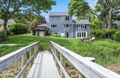 Mattituck House | Luxury waterfront beach house with dock, kayaks canoe, paddle-board and hot tub